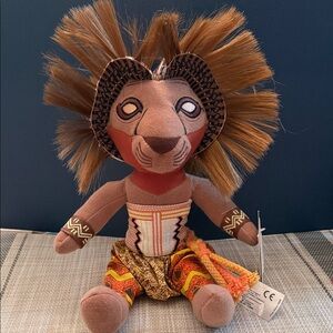 Plush doll of Simba from Disney's The Lion King Broadway musical